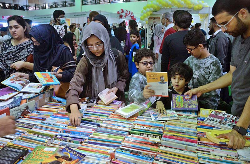 Families are busy in buying books of their interests from stalls in 17th Karachi International Book Fair organized by Pakistan publishers and booksellers association at Expo center