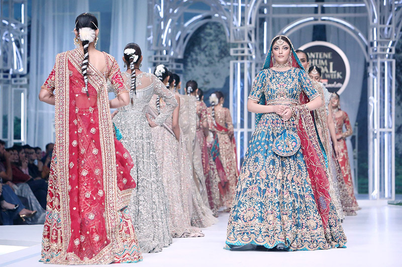 Models walk on the ramp during the 2nd day of the 20th edition of the Pantene Hum Bridal Couture Week