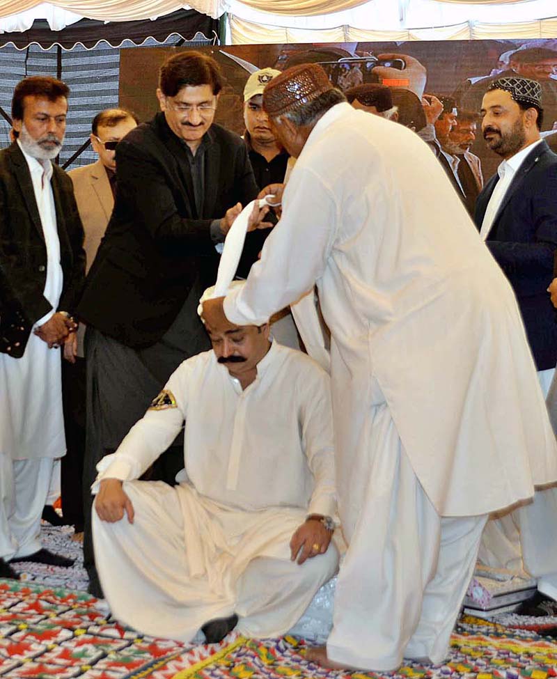 Chief Minister Sindh Syed Murad Ali Shah is doing Dastar Bandi of Muhammad Bakhsh at Shoro Village.