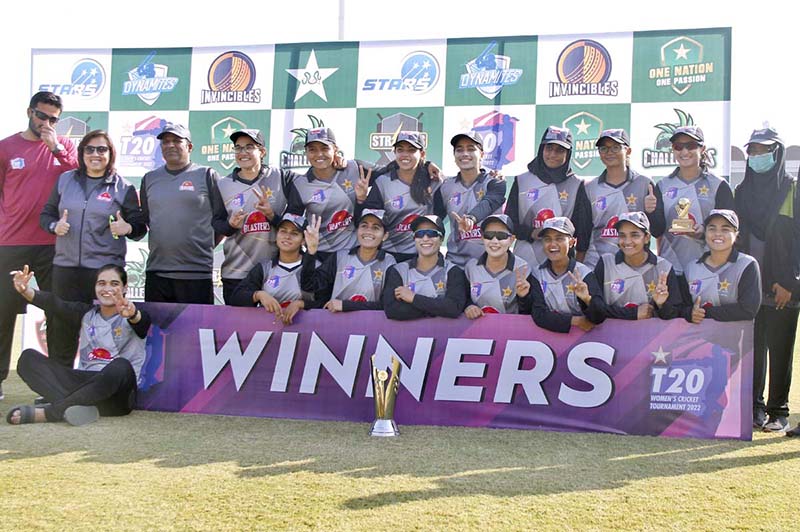 Blasters Women Cricket Team poses for group photograph with the winning trophy after winning the final of the T20 Women's Cricket Tournament 2022-23 at Lahore's Gaddafi Stadium.