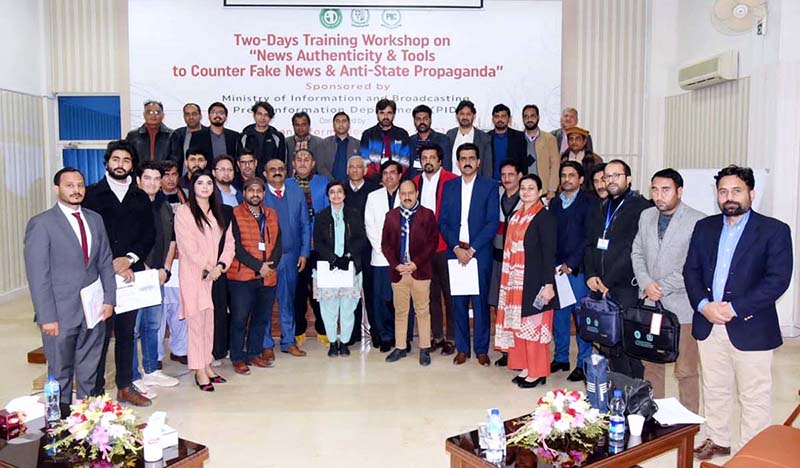 Group photo of the participants of two-day training workshop with guest speaker organized by Pakistan Information Centre of Press Information Department at Information Service Academy