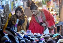 Women from Christian Community shopping for upcoming Christmas celebrations in a shop at Saddar.