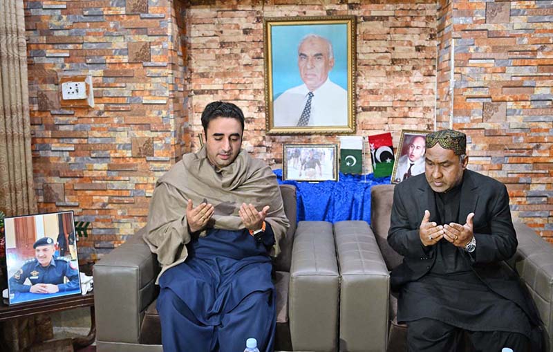Chairman Pakistan People's Party and Foreign Minister Bilawal Bhutto Zardari offering Fateha after condoling with Waris Bhutto brother of Shaheed DSP Abdul Malik Bhutto at his residence Lahori Muhallah
