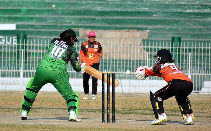 Players in action during cricket match between Lahore Women Cricket Club & Faisalabad Women Cricket teams during T-20 Super Women Cricket Taakara at Iqbal Stadium