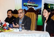 Federal Minister for Railways Khawaja Saad Rafique addressing a press conference at Faletti's Hotel.