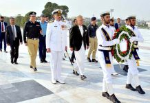 President Dr Arif Alvi receives guard of Honour during visit to the mausoleum of Quaid e Azam.