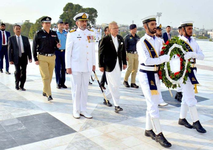 President Dr Arif Alvi receives guard of Honour during visit to the mausoleum of Quaid e Azam.