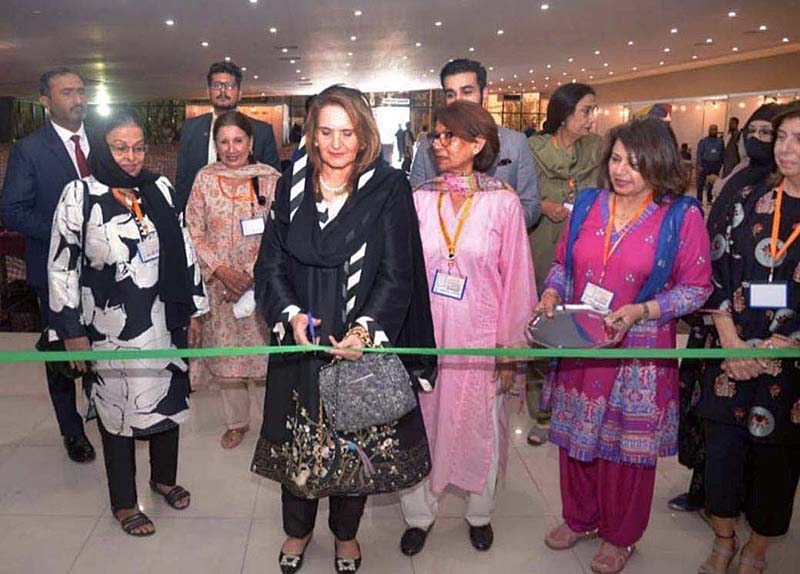First Lady Begum Samina Arif Alvi cutting the inauguration ribbon of the 17th Dachi Exhibition at Expo Center.