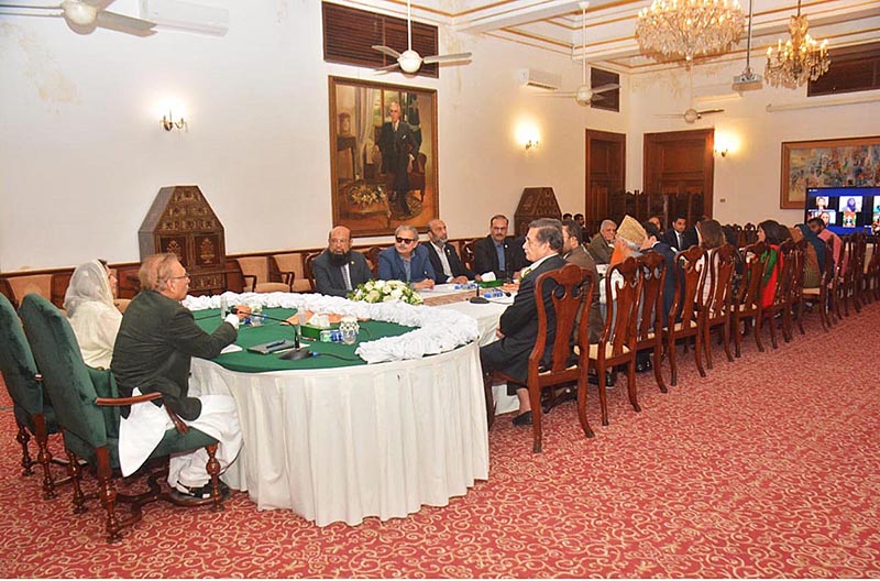 President Dr. Arif Alvi chairing a meeting on the rights of persons with disabilities, attended by the members of the business community at Governor House