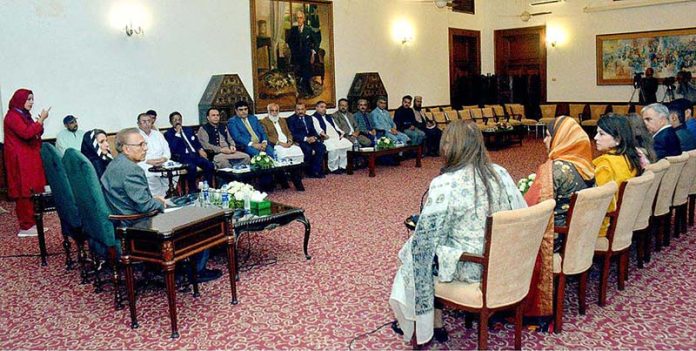 President Dr. Arif Alvi speaking during an Interactive Dialogue on ‘Persons with Disabilities’ organized by World Health Organization (WHO) at Governor House Sindh. First Lady Samina Alvi was also present on the occasion
