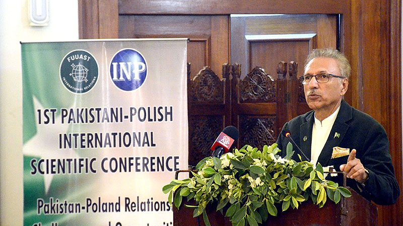 President of Pakistan Dr. Arif Alvi addressing the Inauguration of 1st Pakistan Polish International Scientific Conference organized by Federal Urdu University at Governor House. Vice Chancellor Prof. Dr. Muhammad Zia-ud-Din and others also seen on the stage