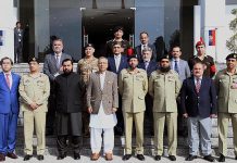 President Dr. Arif Alvi in a group photo with the management of Pakistan Ordnance Factories (POF) during his visit to POF Wah