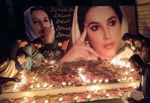 Workers of Pakistan Peoples Party lights candles to pay tribute to Former Prime Minister Shaheed Mohtarma Benazir Bhutto on the occasion of her 15th death anniversary in front of Press Club.
