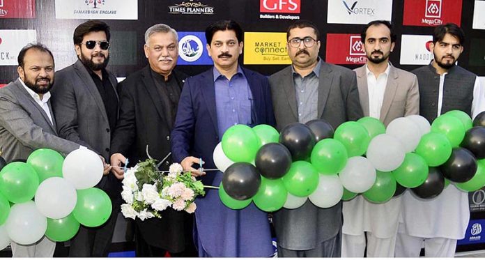 SCCI President Muhammad Ishaq inaugurating Real Estate Investment Exhibition 2022