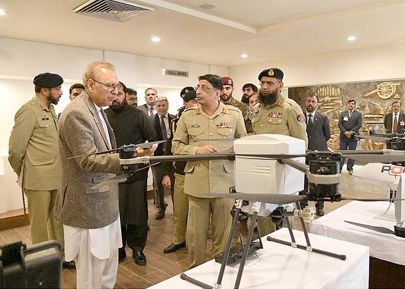 President Dr. Arif Alvi viewing various defense products on display at Pakistan Ordnance Factories Wah