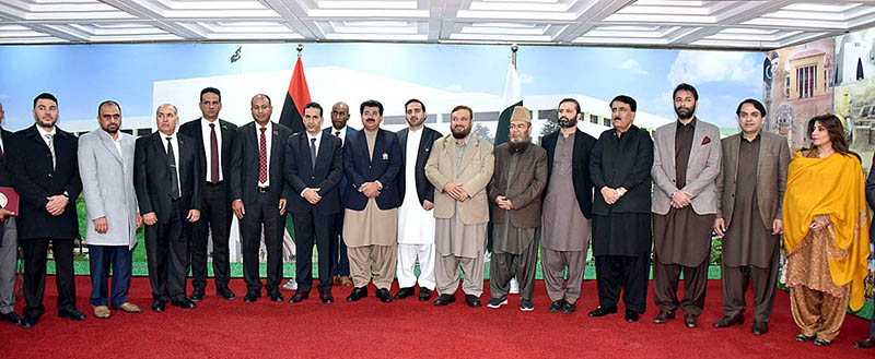 Chairman Senate, Muhammad Sadiq Sanjrani and Senators in a group photo with Libyan Parliamentary Delegation led by Fawzi al-Taher al-Nuwairi, First Deputy Speaker of the Libyan House of Representative at Parliament