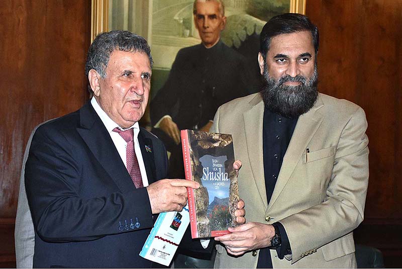 Vice-president of the Azerbaijan National Academy of Sciences, Ph.D. in philology, professor, Honored Scientist of the Republic of Azerbaijan Isa Habibbayli presenting books during a launching ceremony of Mah-e-Nau and Perven Shakir, Sagir Saddique, organized by Directorate of Electronic Media and Publications (DEMP) and Ministry of Information with collaboration of GC University at Governor House