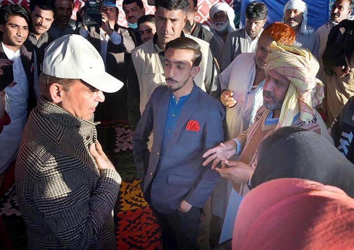 Prime Minister Muhammad Shehbaz Sharif interacts with the flood affectees of District Khairpur