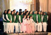 Children performing medley and paying tribute to Quaid-e-Azam Muhammad Ali Jinnah on his 146th birth anniversary at Aiwan-e-Sadr.