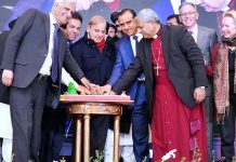 Prime Minister Muhammad Shehbaz Sharif cutting cake during a ceremony organised in view of Christmas Celebrations.