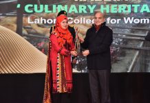 Prime Minister Muhammad Shehbaz Sharif giving award to student during National Amateur Short Film Festival Award distributing Ceremony at PM Secretariat