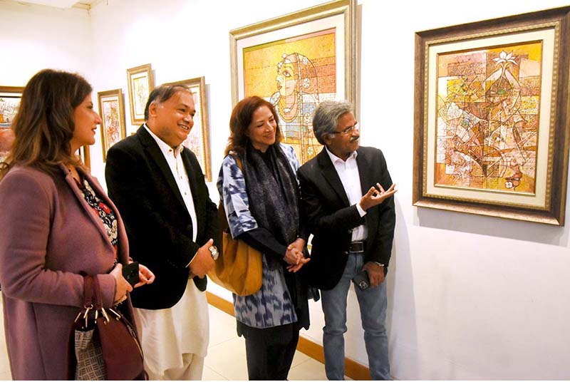 Visitor viewing and appreciating paintings at the solo Painting Exhibition Soul of Impressionism by Chitra Pritam at Ocean Art Gallery