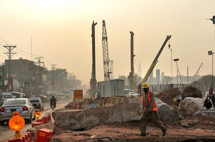 Heavy machinery is being used during construction work of Bhara Kaho Bypass along Sirinagar Highway