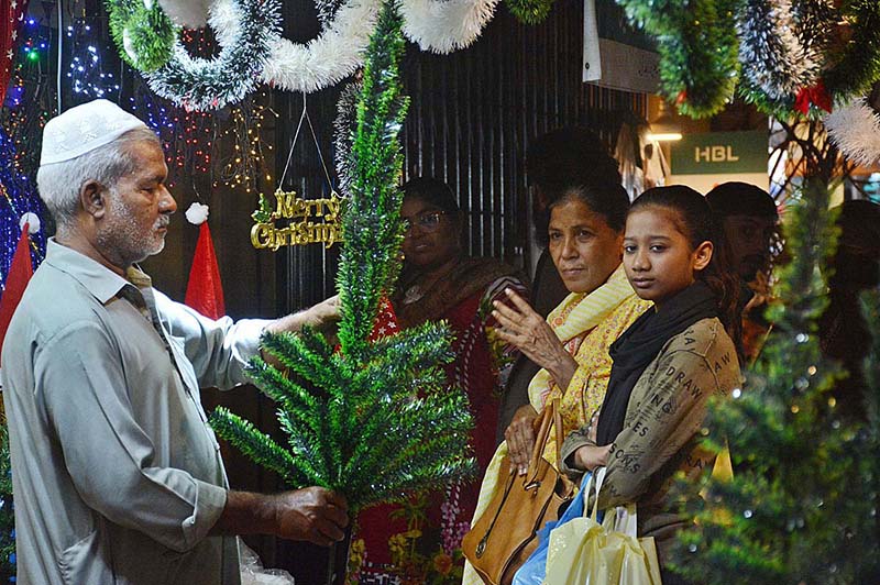Woman from Christian Community shopping for upcoming Christmas at Saddar area
