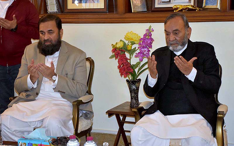 Governor Punjab Muhammad Balighur Rehman is offering Dua for brother of Muhammad Manshaullah Butt MPA at his residence