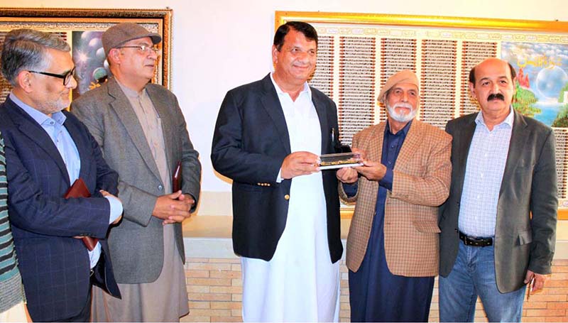 Adviser to the Prime Minister on National Heritage and Culture Division, Engr. Amir Muqam taking round of displayed frames at Special Quran Exhibition at PNCA