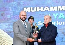 Prime Minister Muhammad Shehbaz Sharif giving Award to Muhammad Bilal Tariq who won 3rd position in Special Category of National Amateur Short Film Festival (NASFF) 2022