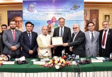 Federal Minister for Planning, Development and Special Initiatives, Prof. Ahsan Iqbal being presented with memento during his visit to Karachi Chamber of Commerce and Industry KCCI.