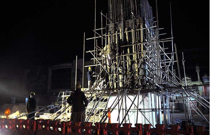 Workers busy in construction of Bhara Kahu Bypass