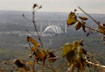 An eye catching view of Faisal Mosque from famous picnic point Damn-e-Koh