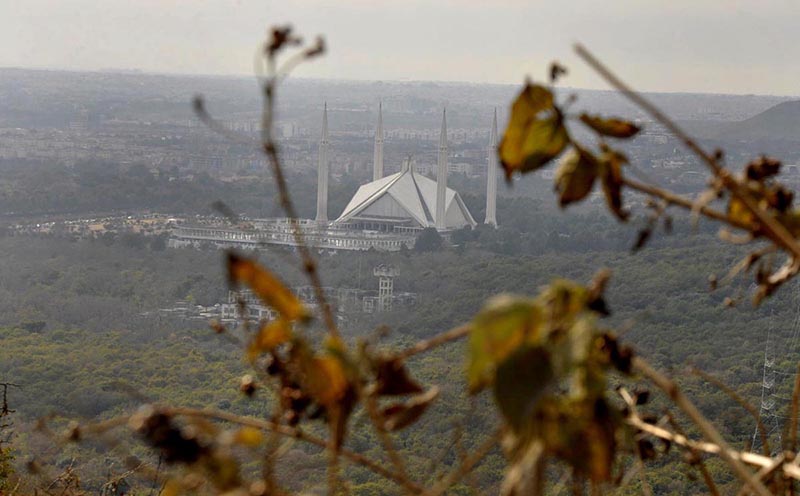 An eye catching view of Faisal Mosque from famous picnic point Damn-e-Koh