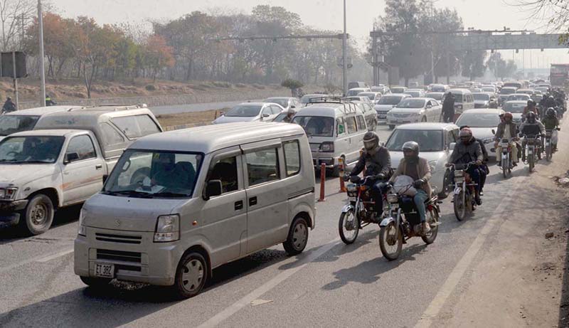Capital police checking motorcyclist during snap checking at Expressway