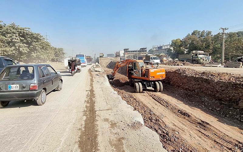 Heavy machinery being used for construction work of IJP Road during development work in the city