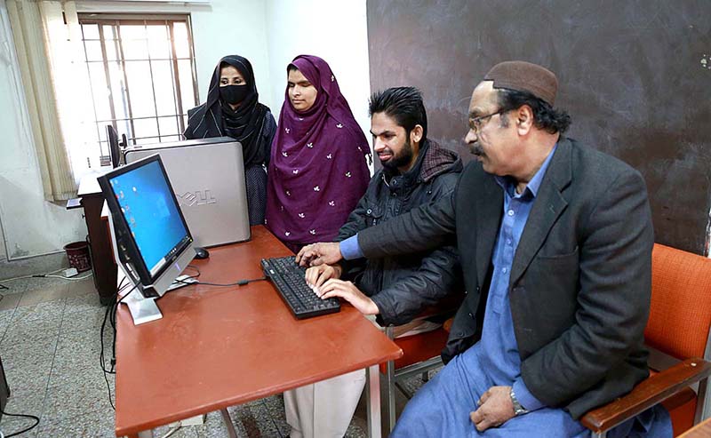 Teachers giving training to blind students "how to use white stick" during a two-week training classes at National Mobility and Independence Training Centre in which blind people from different cities participated on the eve of Braille World Day