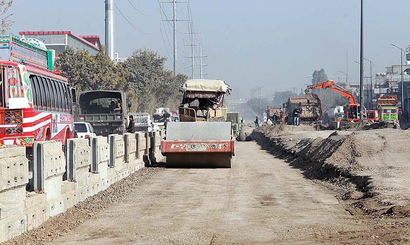 Heavy machinery being used for construction work of IJP Road during development work in the city