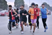 Youngsters running at Islamabad expressway