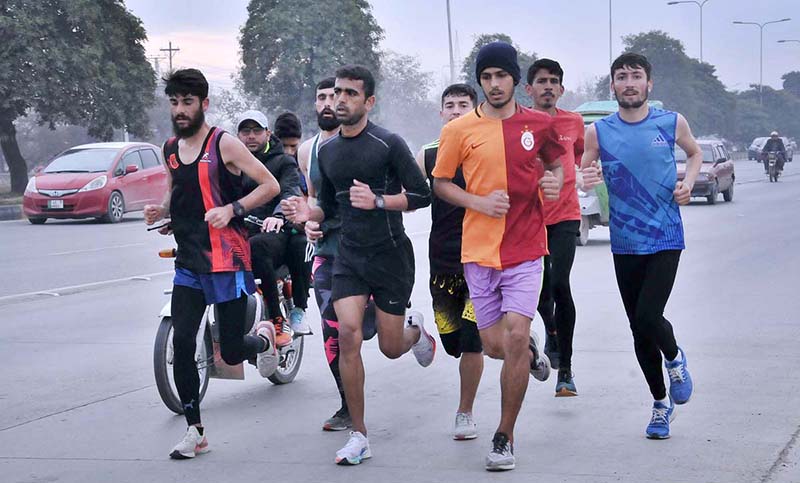 Youngsters running at Islamabad expressway