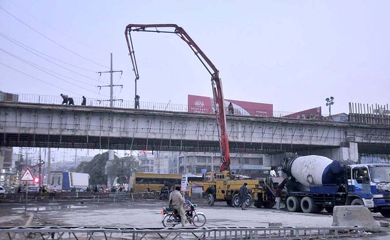 A view of construction work of bridge at IJP Road during development work in the city.