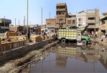 A view of sewerage water accumulated creating hurdle for traders at vegetable market need the attention of concerned authorities on the city
