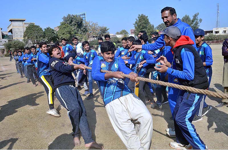 Students are participating in tug of war competition during Dar-E-Arqam School Sports Gala