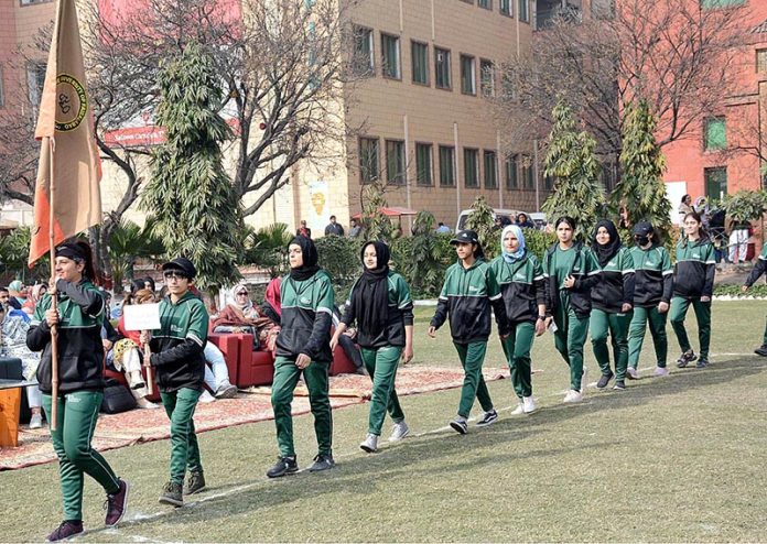 Sports women march-past parade during inauguration ceremony of All Pakistan 10th HEC Intervarsity Netball Women Championship 2023 at The University of Faisalabad