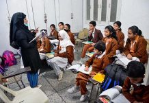 Students attending the class on first day of school opening after winter vacations at RC School