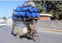 A tricycle holder on the way with overloaded his vehicle may cause any mishap in the city