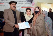 Federal Minister for Overseas Pakistan and Human Resource Development Mr. Sajid Hussain Turi and PPP Senator Rubina Khalid giving certificates to a graduate student during the Toolkit & Certificates Awarding ceremony Among Women Graduates of kurram District in Employable Skill a joint initiative by PGFRC, STVSP, KP-TEVTA and Ministry of Overseas Pakistani & Human Resource Development at GTVC (W) Hayatabad