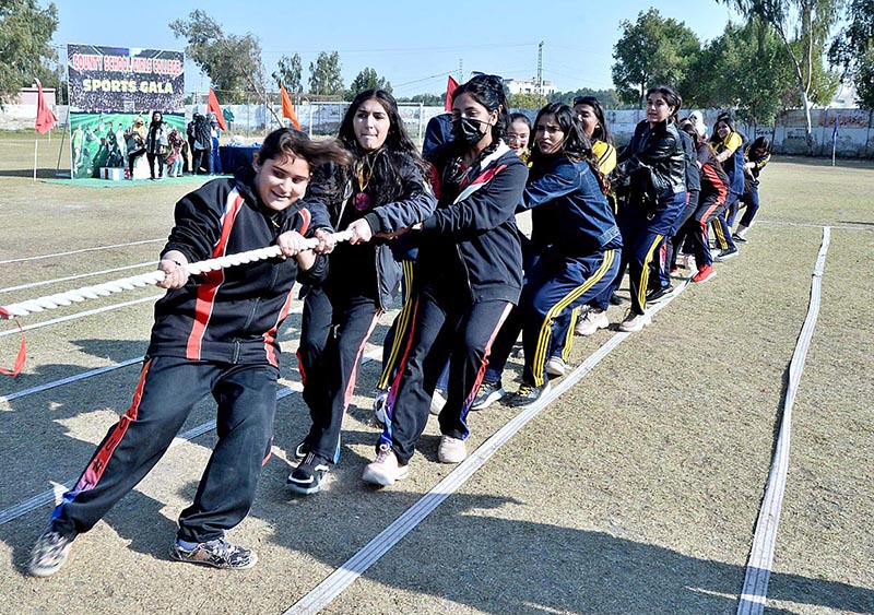 Students in action to pulling rope with full force during tug and war games in county school & collage Sports gala at public school ground