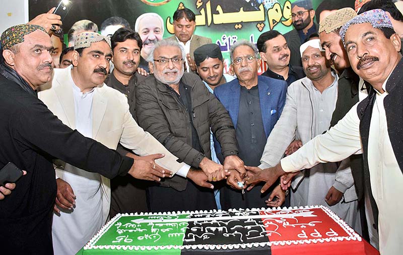 District President PPP, MNA Khurshid Ahmed Junijo along with party workers cutting the cake of 95th birth day anniversary of Former Prime Minister Shaheed Zulfiqar Ali Bhutto at Begum Nusrat Bhutto Hall Jinnah Bagh